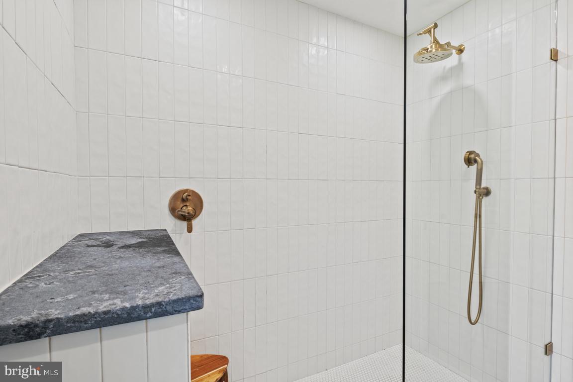 121 Gwynedd Manor Road North Wales, PA 19454 - Photo 33 of 59 Sleek, modern shower with elegant fixtures.