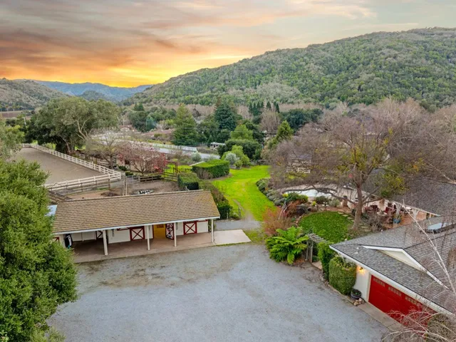 an aerial view of a house with a garden