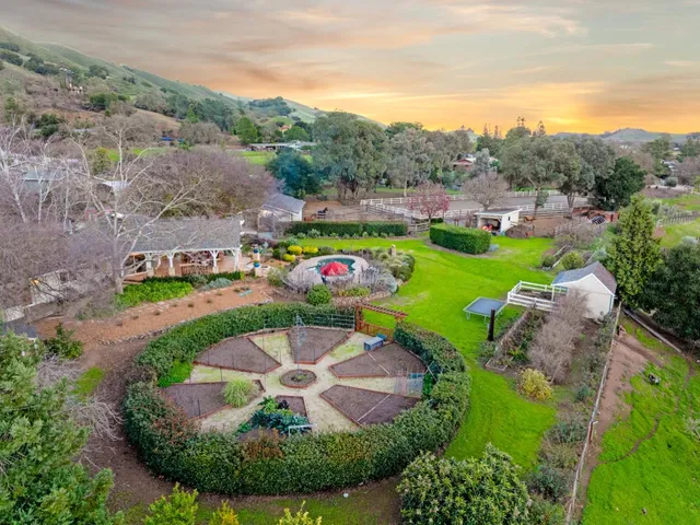 a backyard of a house with lots of green space