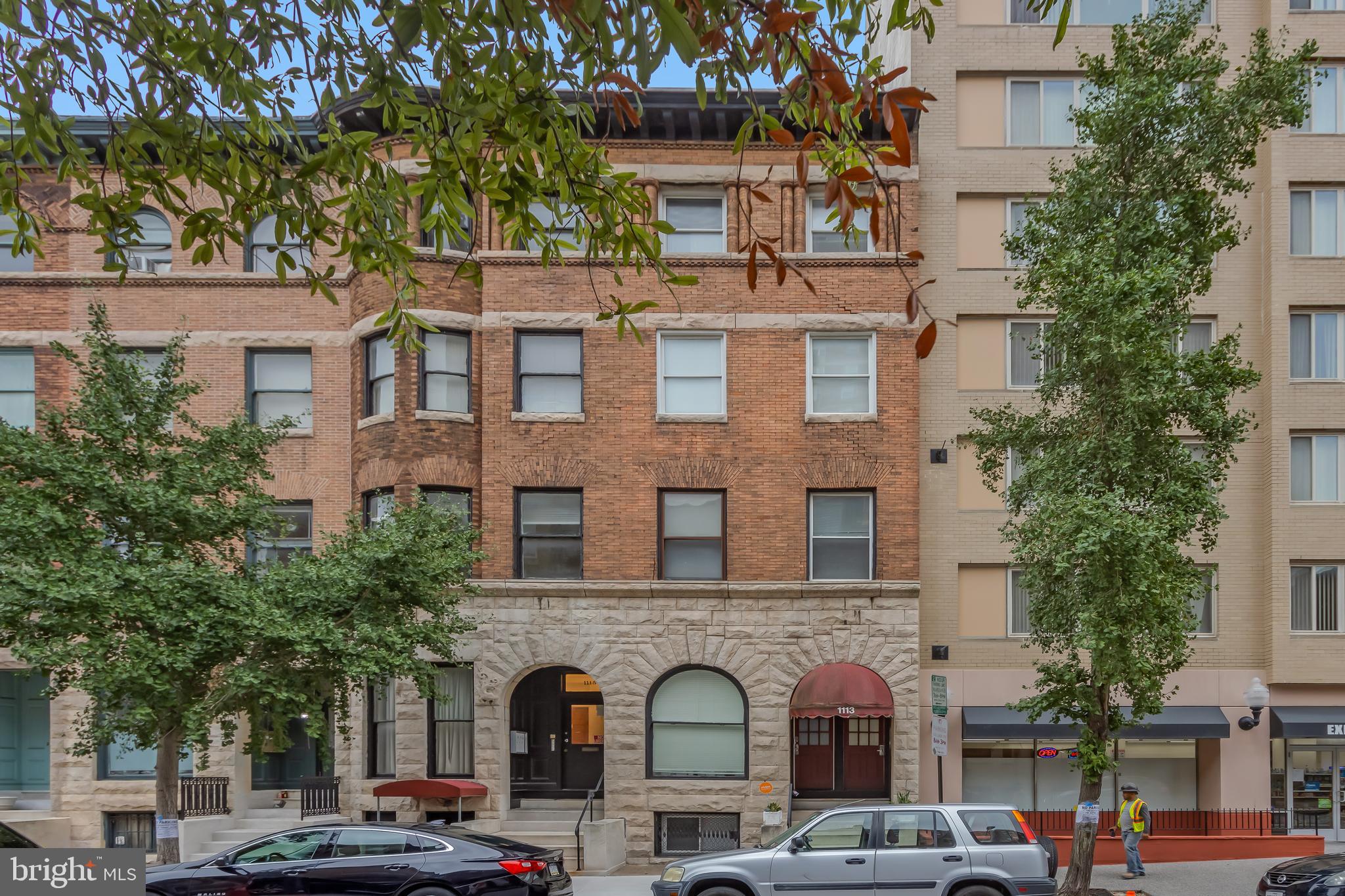 1113 North Calvert Street, Unit B Baltimore, MD 21202 - Photo 2 of 6 a front view of multiple houses