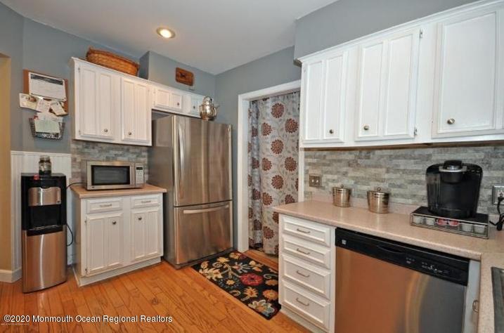 convenient mudroom/laundry off kitchen