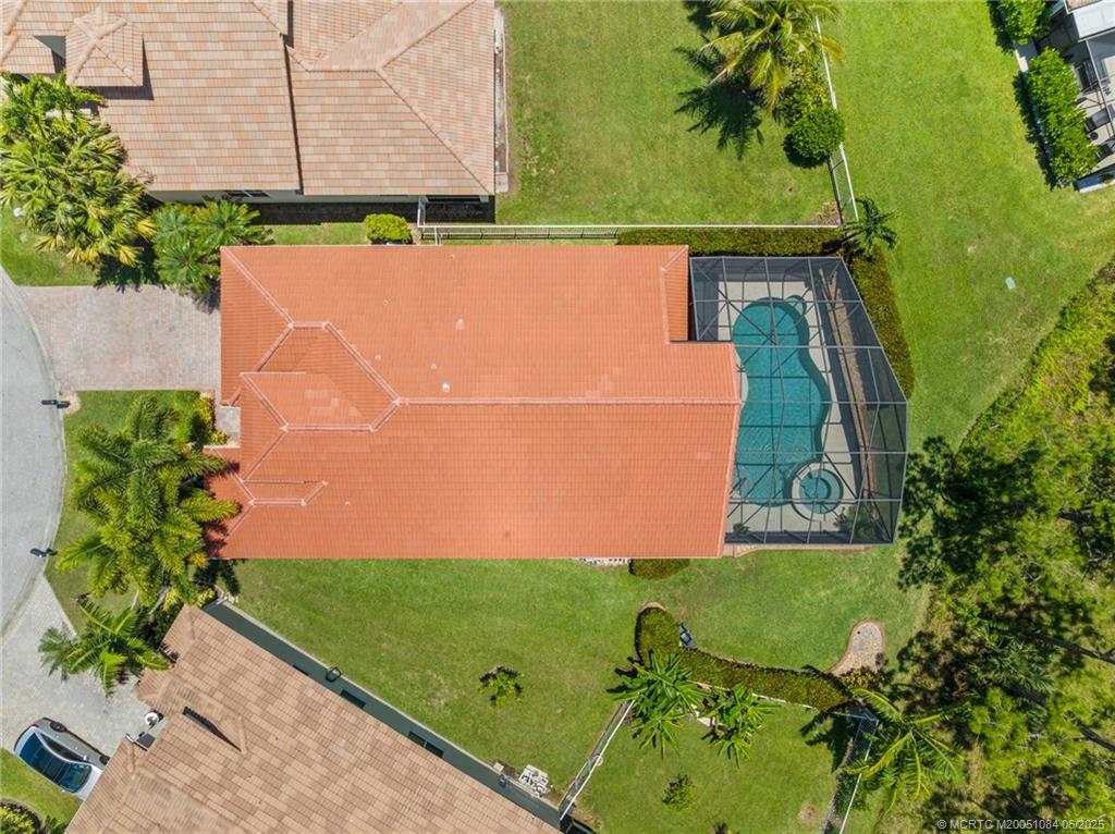 2688 Southeast Castle Pine Place Stuart, FL 34997 - Photo 38 of 49 an aerial view of a house