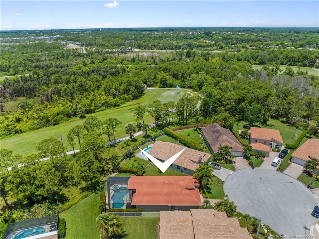 2688 Southeast Castle Pine Place Stuart, FL 34997 - Photo 43 of 49 an aerial view of multiple house