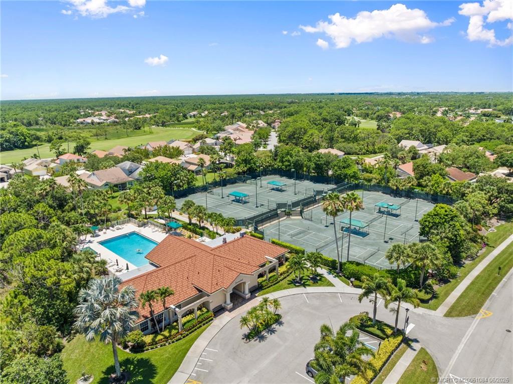 2688 Southeast Castle Pine Place Stuart, FL 34997 - Photo 46 of 49 an aerial view of residential houses with outdoor space