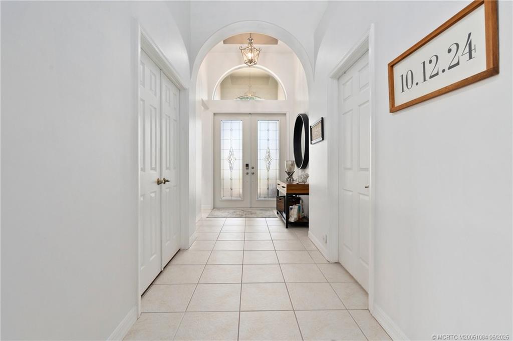 2688 Southeast Castle Pine Place Stuart, FL 34997 - Photo 9 of 49 a view of a hallway view with staircase