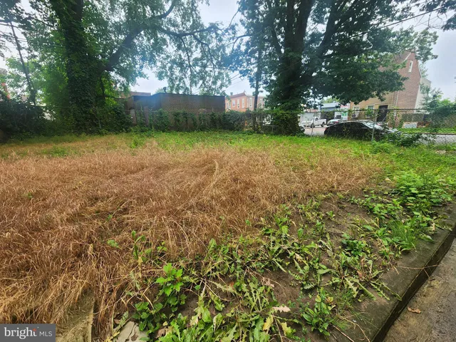 a view of a room with furniture and screen tv