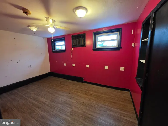 a bathroom with a toilet and a sink
