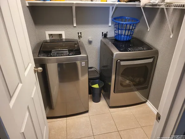a kitchen with a stove and a microwave