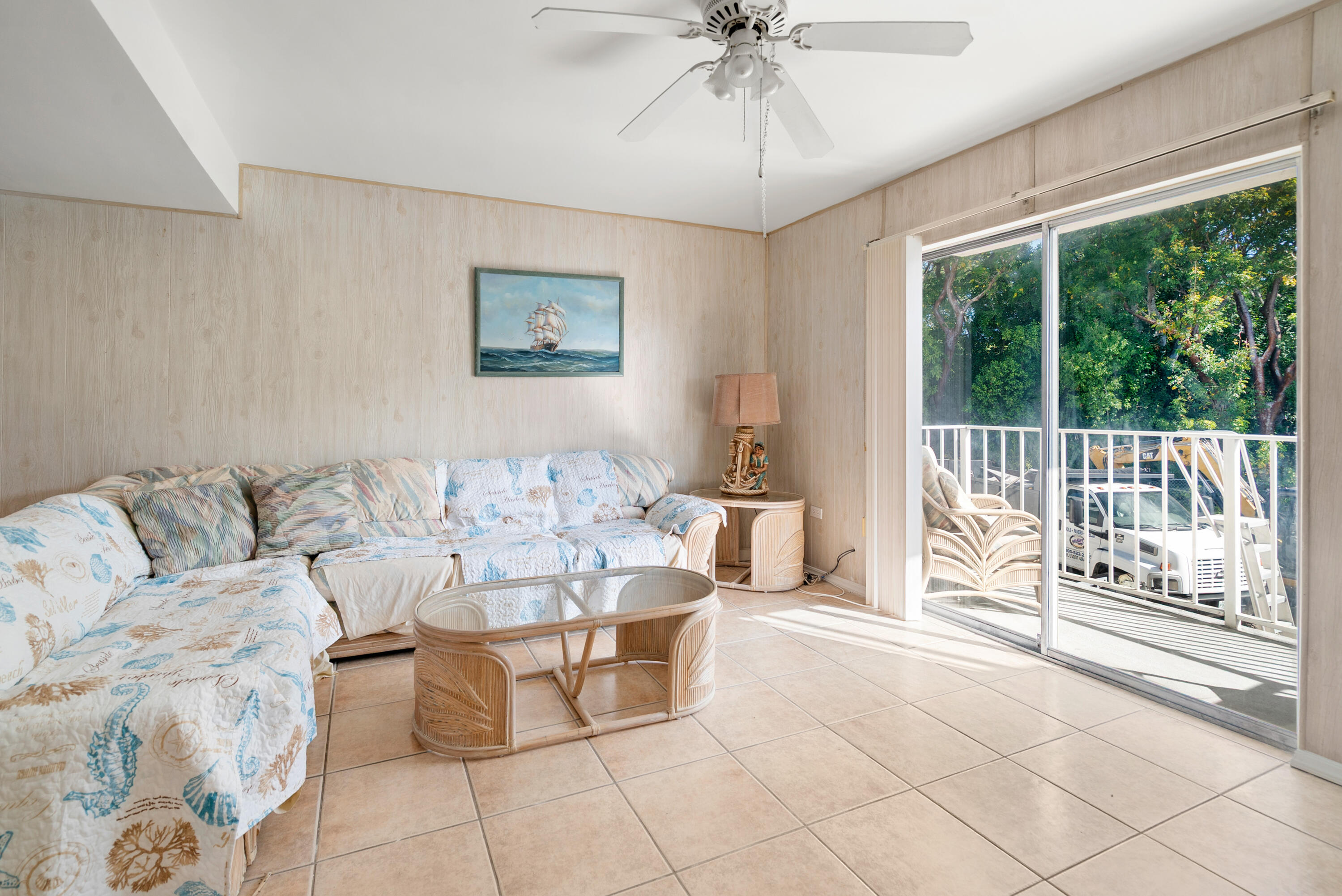 300 Ocean Drive, Unit 23 Key Largo, FL 33037 - Photo 6 of 29 a living room with furniture and a large window