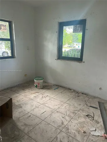 a view of a room with a window