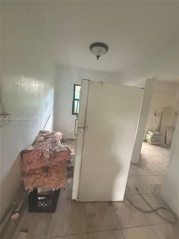 a view of a hallway with entryway