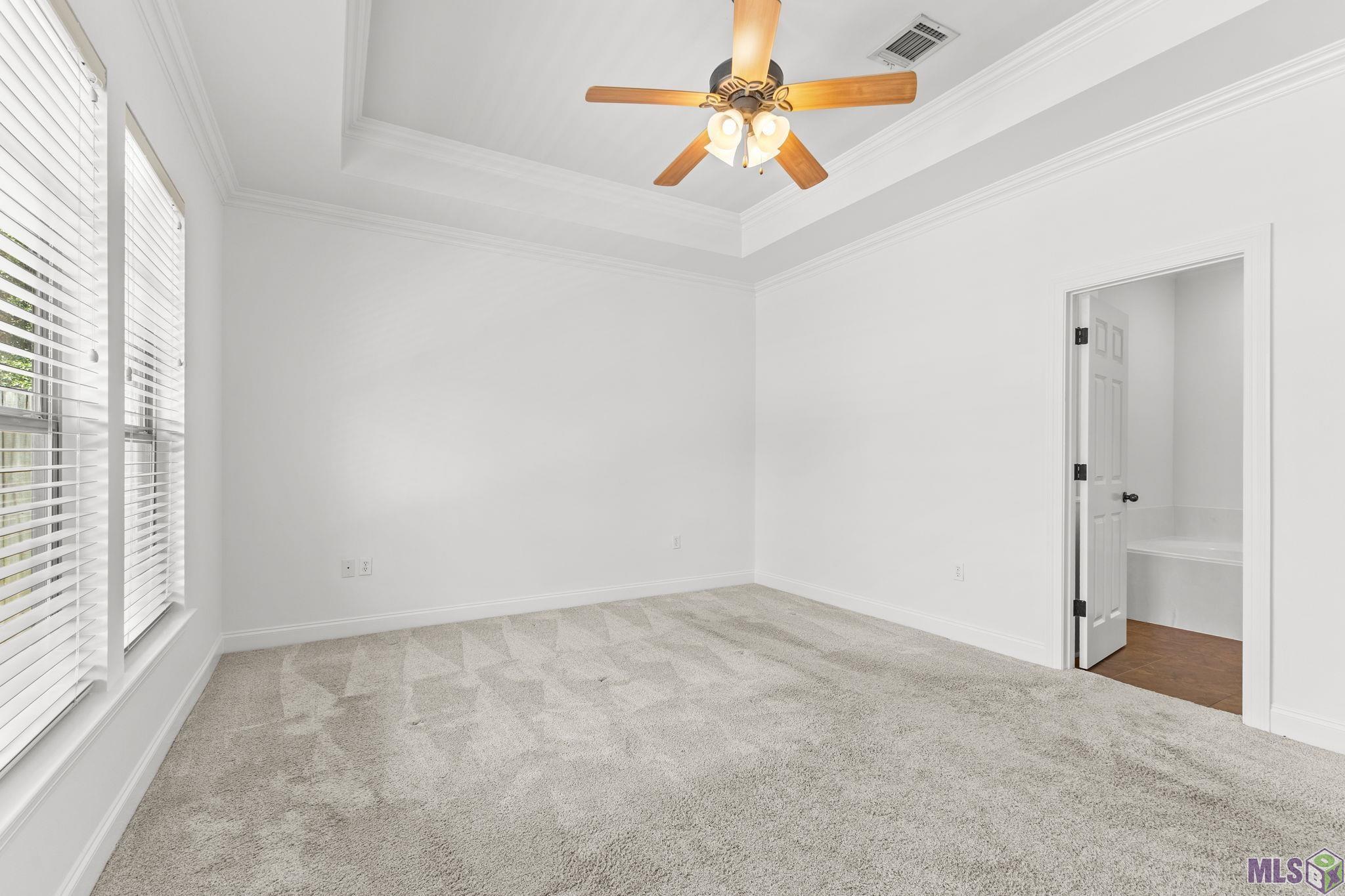 703 Ross's Turn Baton Rouge, LA 70810 - Photo 11 of 27 Primary with Tray Ceiling