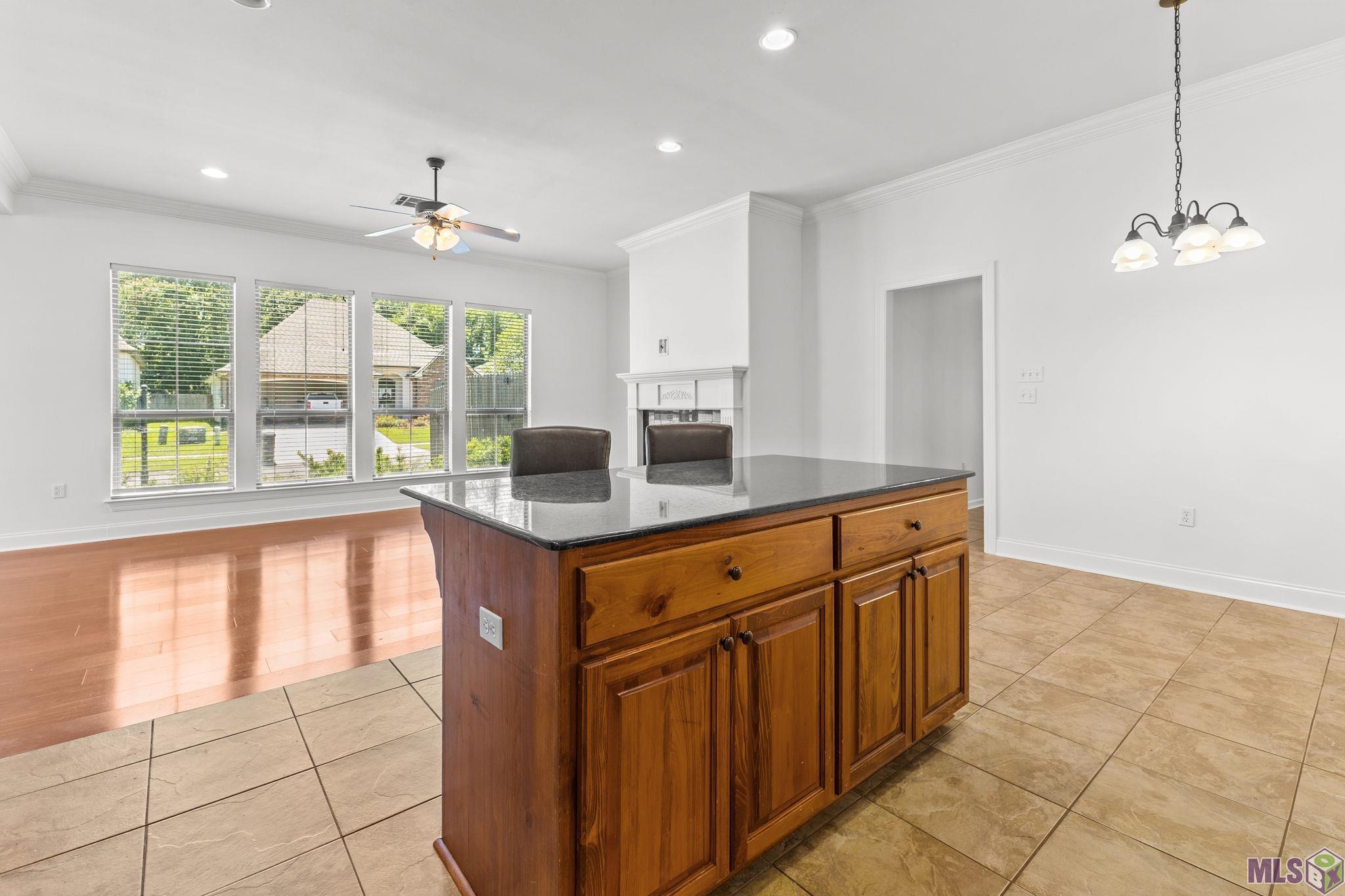 703 Ross's Turn Baton Rouge, LA 70810 - Photo 7 of 27 Kitchen looking into Living Room