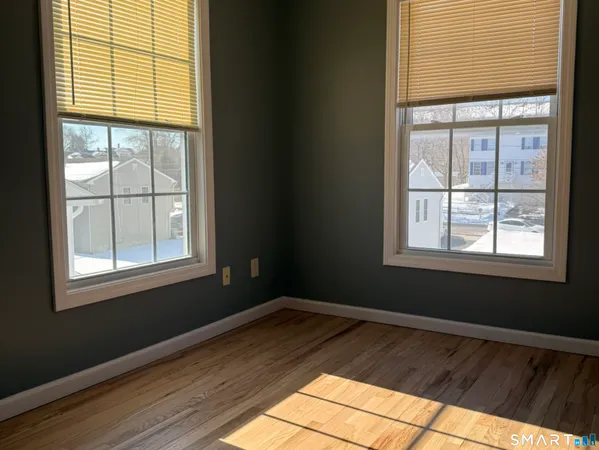 a view of a room that has a window in it