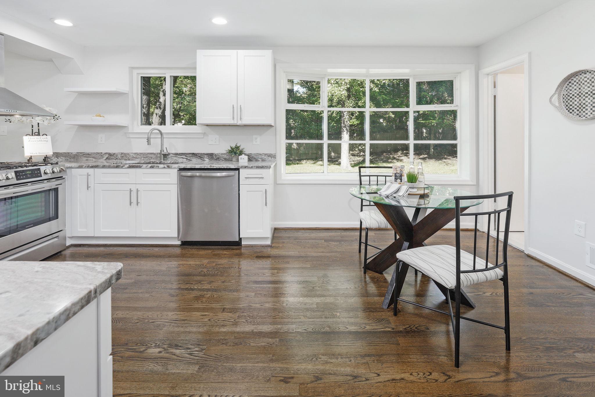 6814 Landor Lane Springfield, VA 22152 - Photo 15 of 38 Main level half bath off kitchen eat-in area