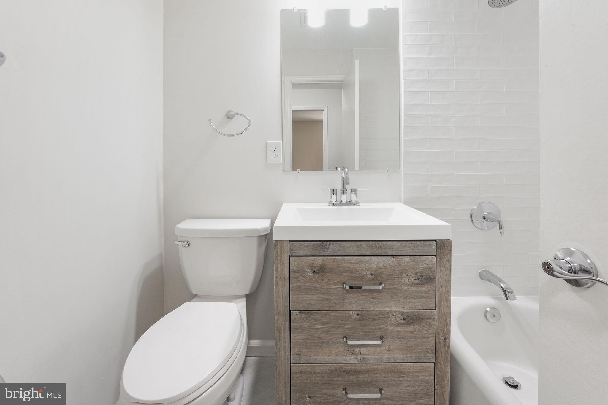 6814 Landor Lane Springfield, VA 22152 - Photo 28 of 38 updated upstairs hall bathroom