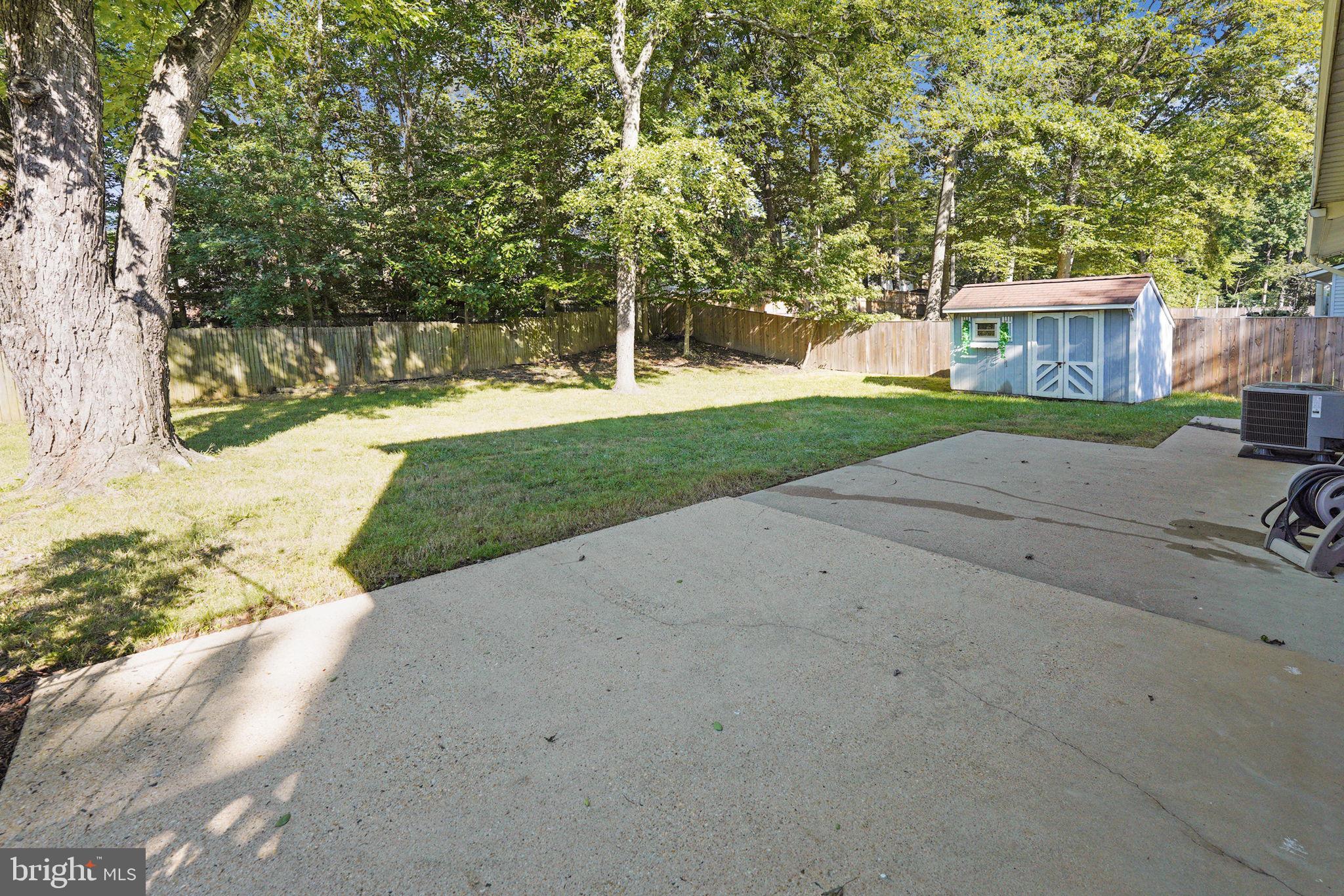 6814 Landor Lane Springfield, VA 22152 - Photo 36 of 38 concrete patio with room for table & seating area