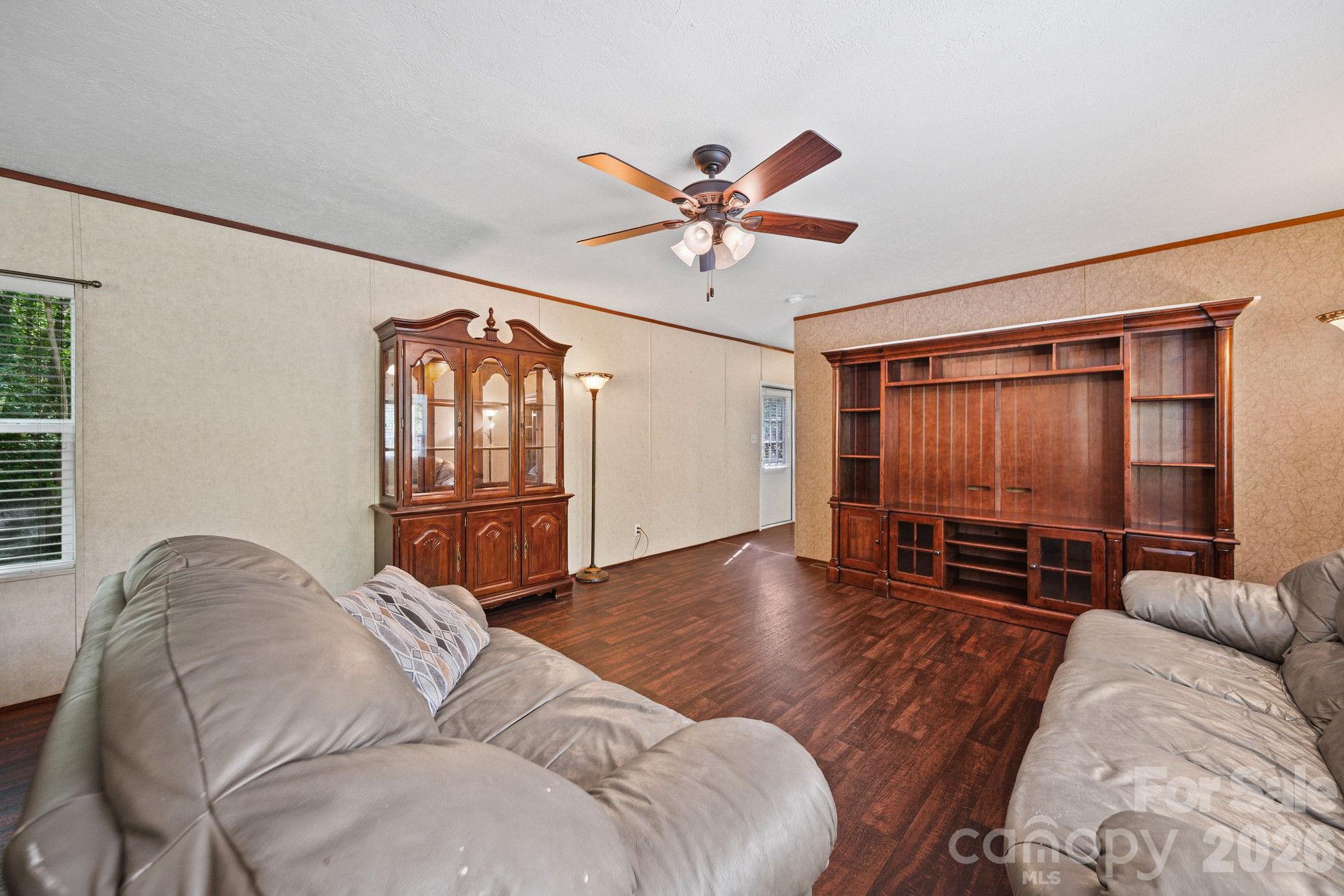 4507 White Store Road Wingate, NC 28174 - Photo 8 of 29 a living room with furniture and a window