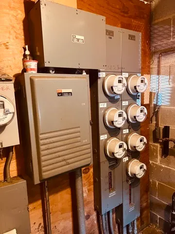 a bathroom with a sink mirror and toilet