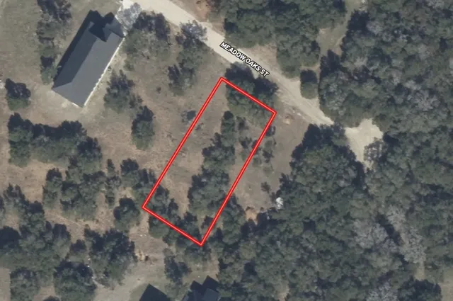 a backyard of a house with a yard