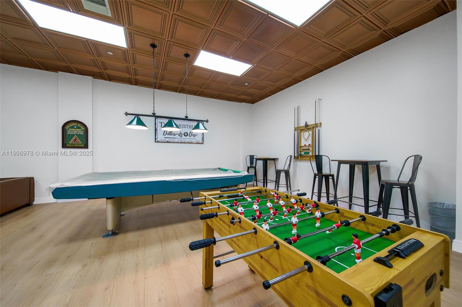 5825 Collins Avenue, Unit 10G Miami Beach, FL 33140 - Photo 49 of 51 a room with musical instruments