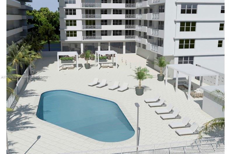 5825 Collins Avenue, Unit 10G Miami Beach, FL 33140 - Photo 50 of 51 a view of a building with seating space