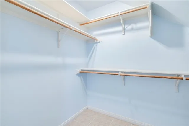 a view of an empty walk in closet
