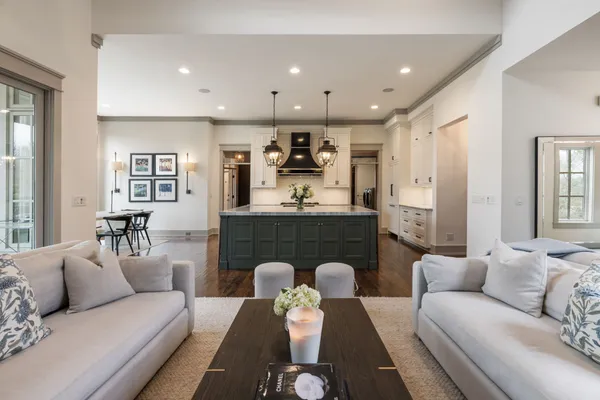 a view of a dining room with furniture and windows