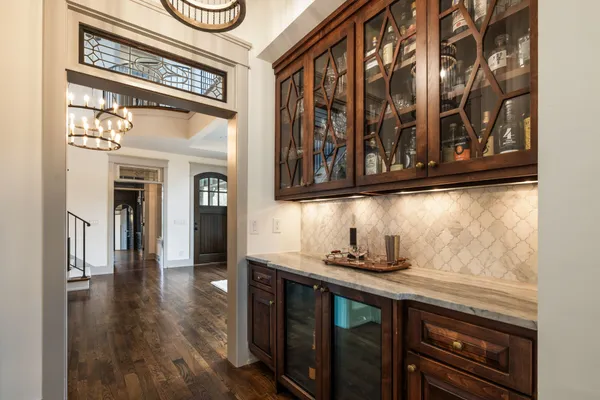 a view of walk in closet and empty room