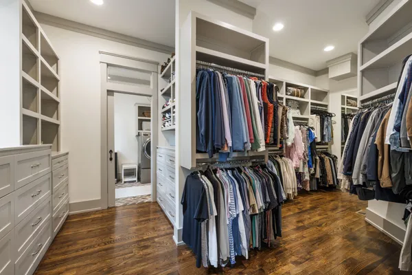 a view of a house with swimming pool and a yard