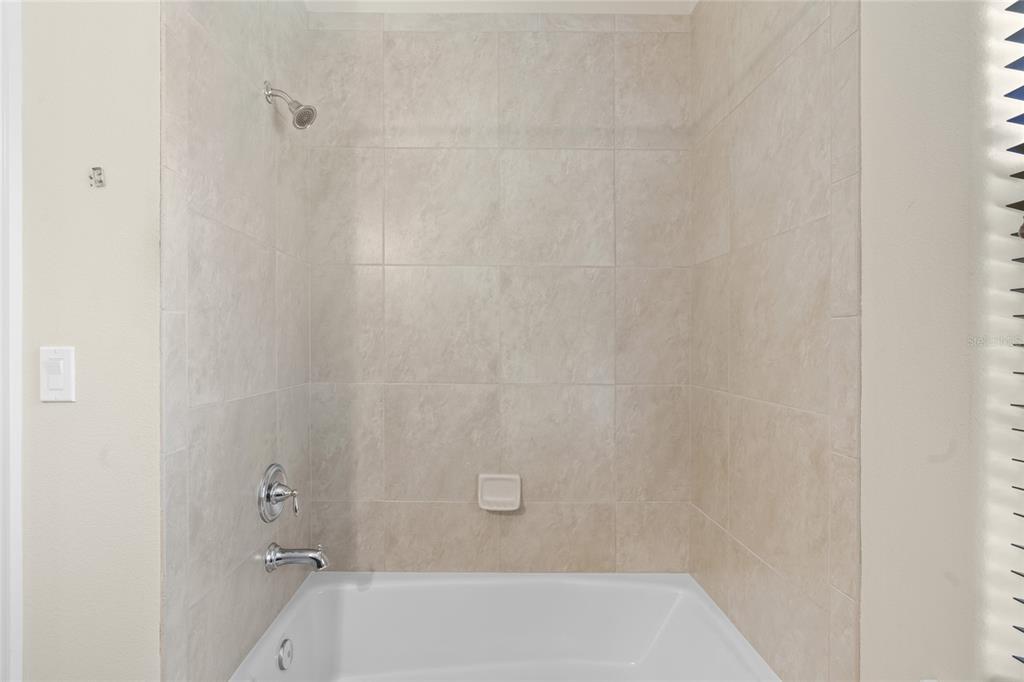 4117 Southeast 21st Street Ocala, FL 34471 - Photo 24 of 38 a bathroom with a shower