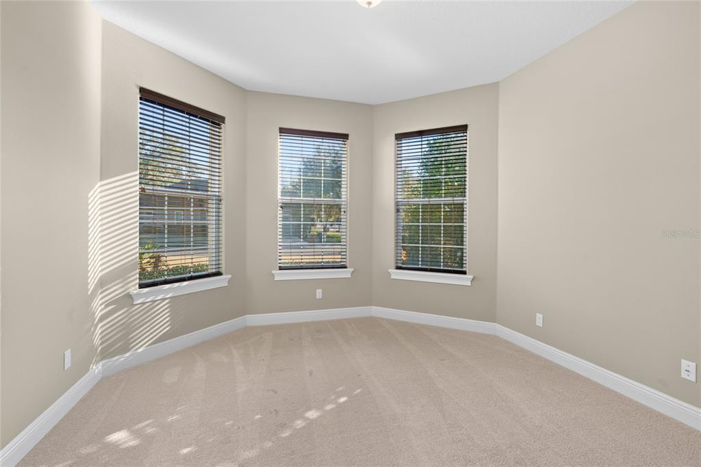 4117 Southeast 21st Street Ocala, FL 34471 - Photo 30 of 38 a view of an empty room with a window