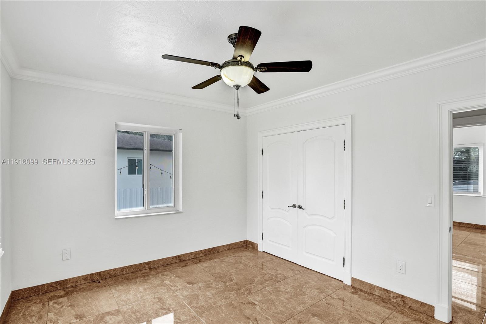 5801 Southwest 20th Street Miami, FL 33155 - Photo 25 of 40 a view of empty room with window