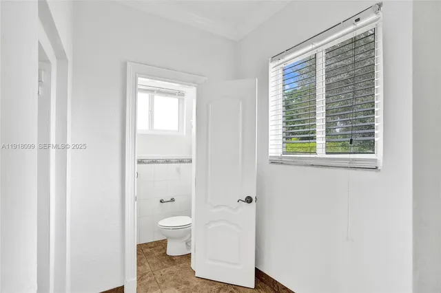 a bathroom with a sink a mirror and shower