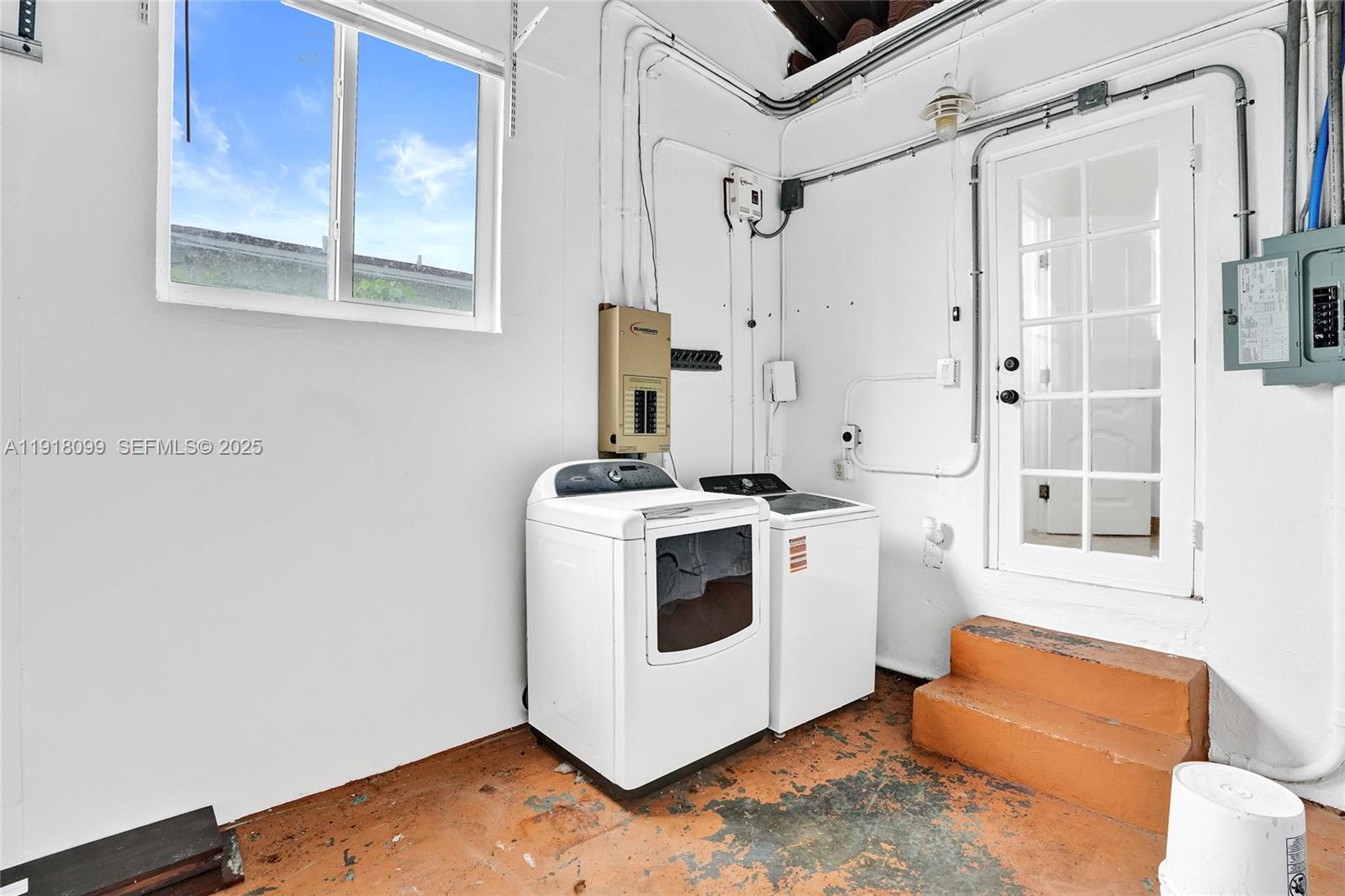 5801 Southwest 20th Street Miami, FL 33155 - Photo 30 of 40 a utility room with dryer and washer