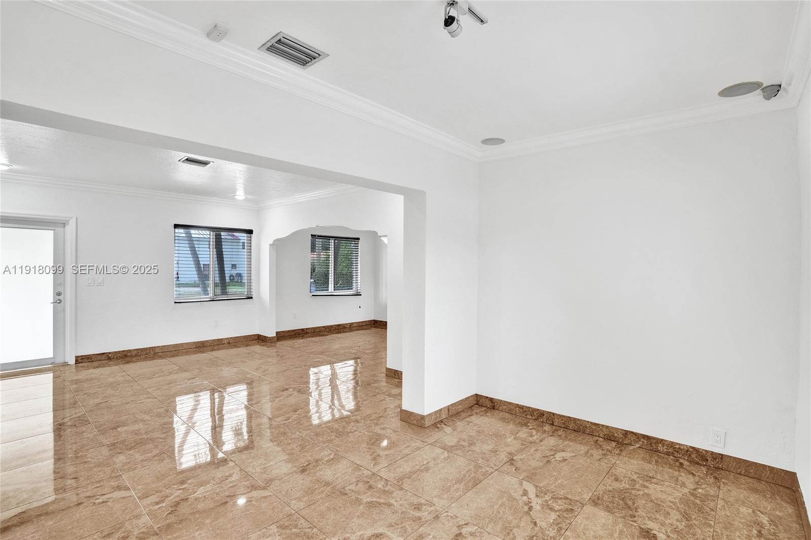 5801 Southwest 20th Street Miami, FL 33155 - Photo 6 of 40 a view of an empty room