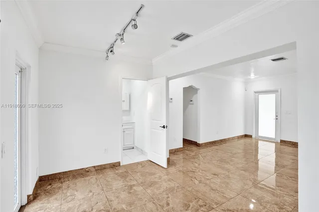 a view of a room that has a window in it