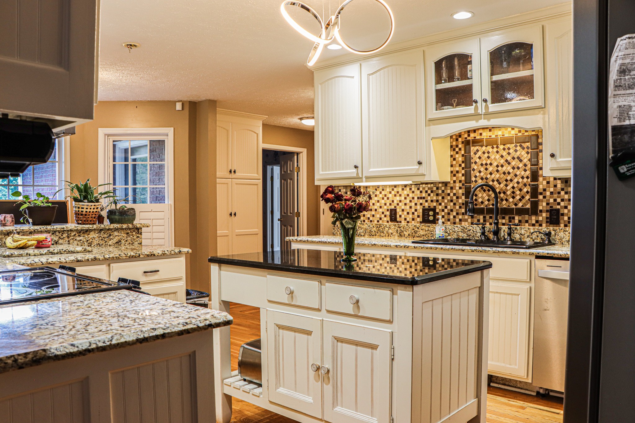 2963 Cole Ridge Road Beechgrove, TN 37018 - Photo 12 of 31 a kitchen with stainless steel appliances granite countertop a sink and a stove