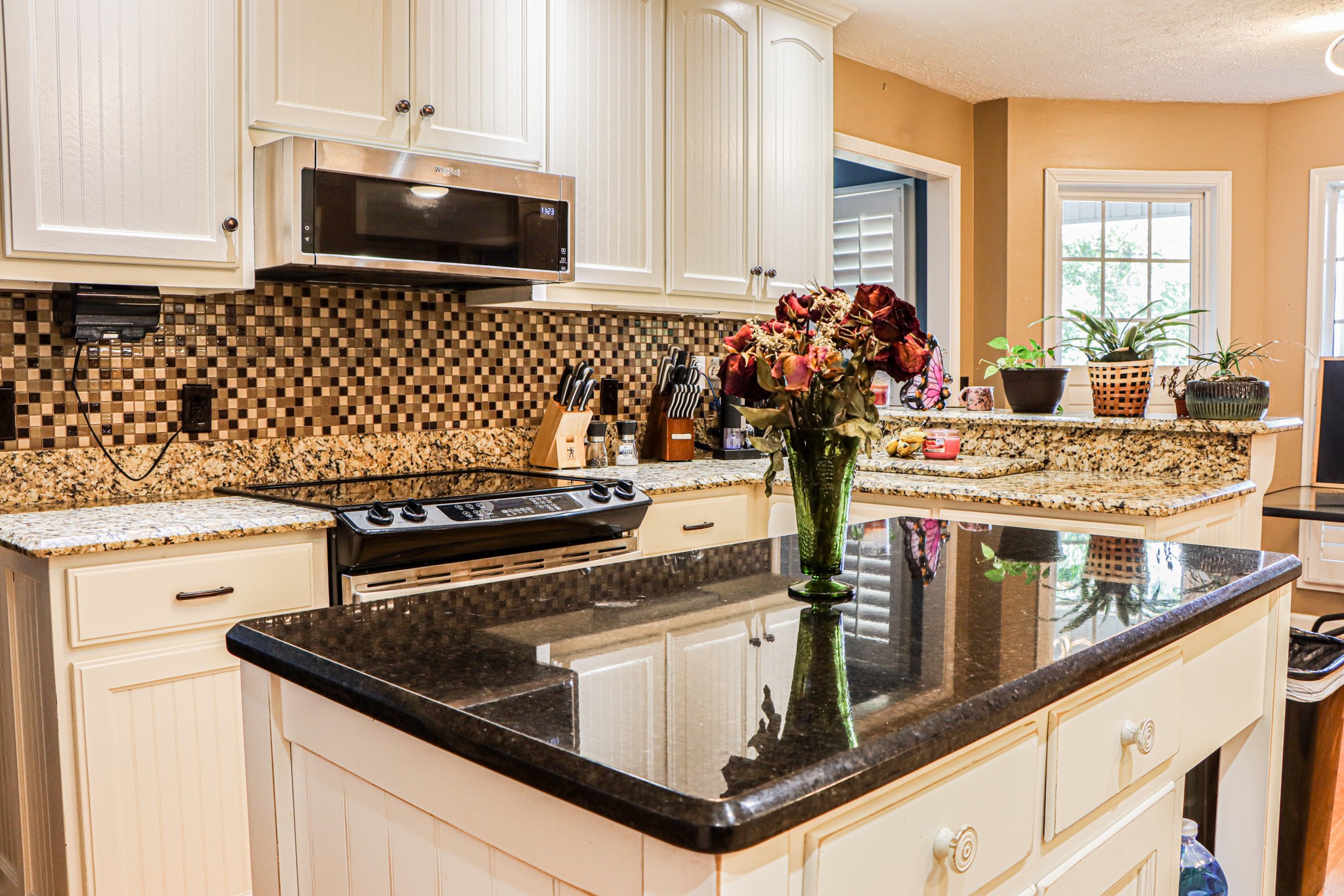 2963 Cole Ridge Road Beechgrove, TN 37018 - Photo 13 of 31 a kitchen with stainless steel appliances granite countertop a stove and a microwave