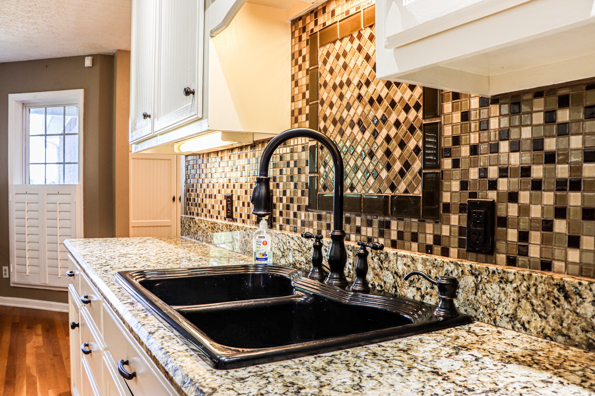 2963 Cole Ridge Road Beechgrove, TN 37018 - Photo 15 of 31 a kitchen with a sink and a stove top oven
