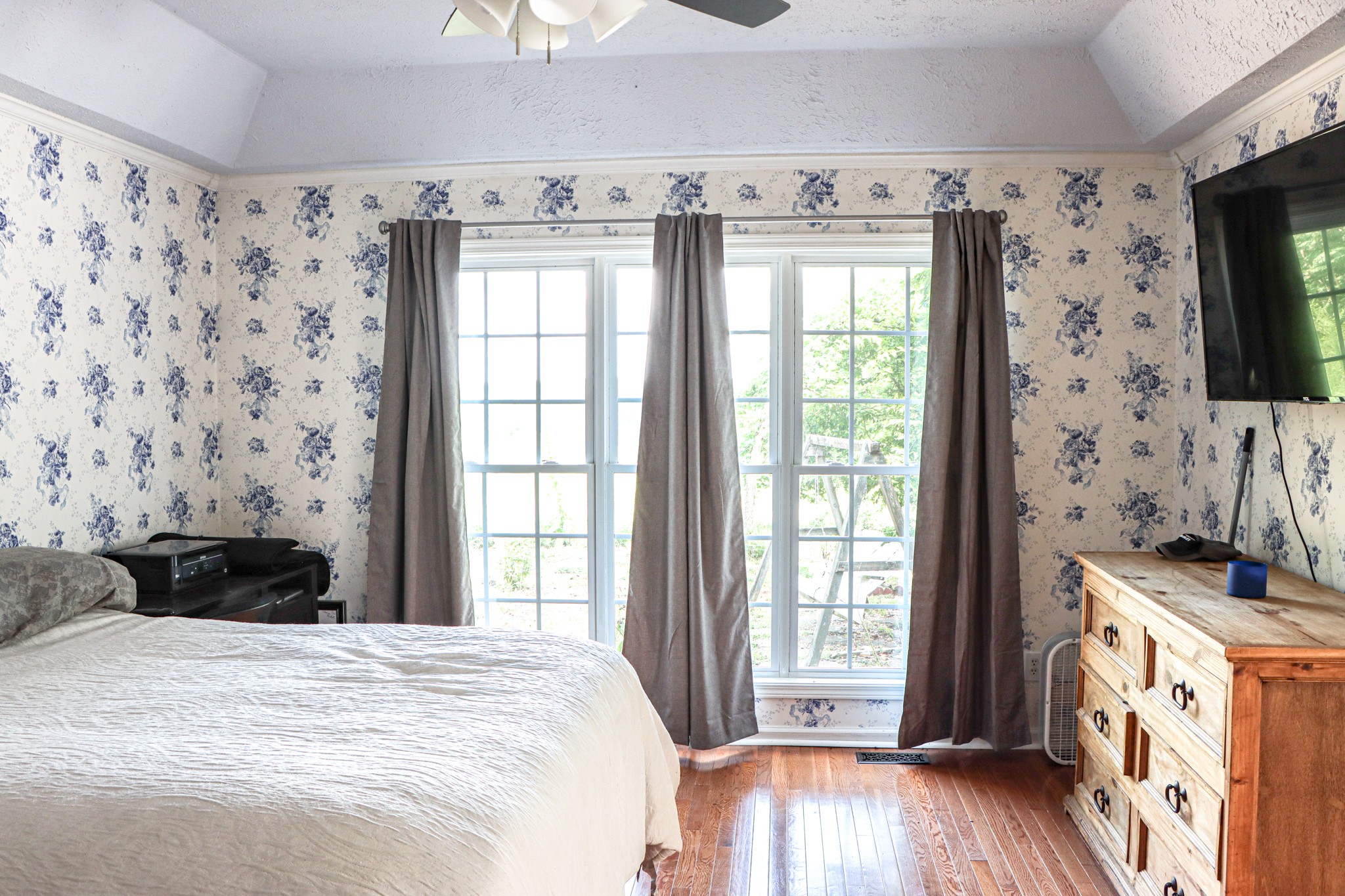2963 Cole Ridge Road Beechgrove, TN 37018 - Photo 17 of 31 a bedroom with a bed and a flat tv screen on dresser