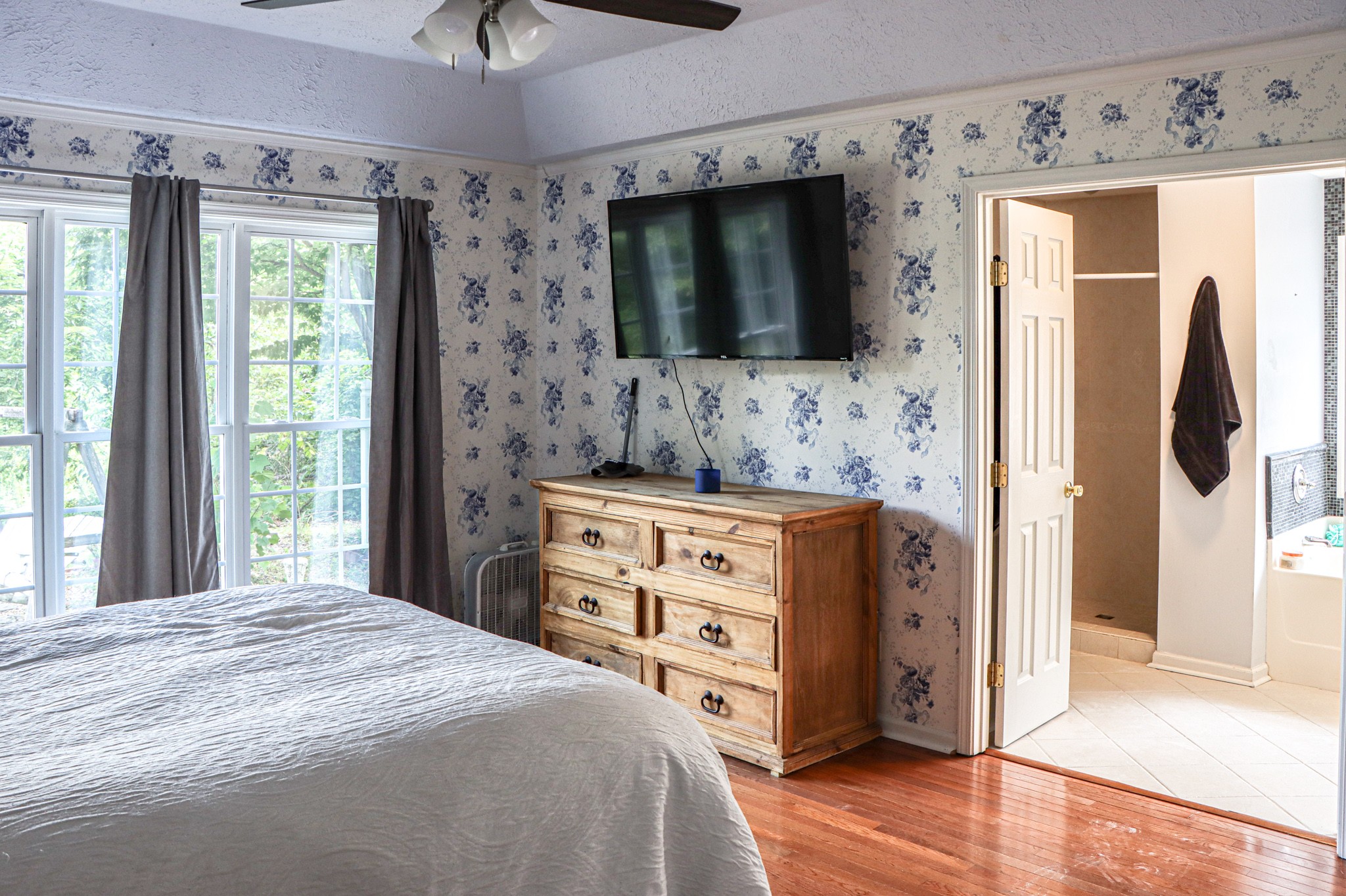 2963 Cole Ridge Road Beechgrove, TN 37018 - Photo 19 of 31 a spacious bathroom with a double vanity sink a large mirror and shower