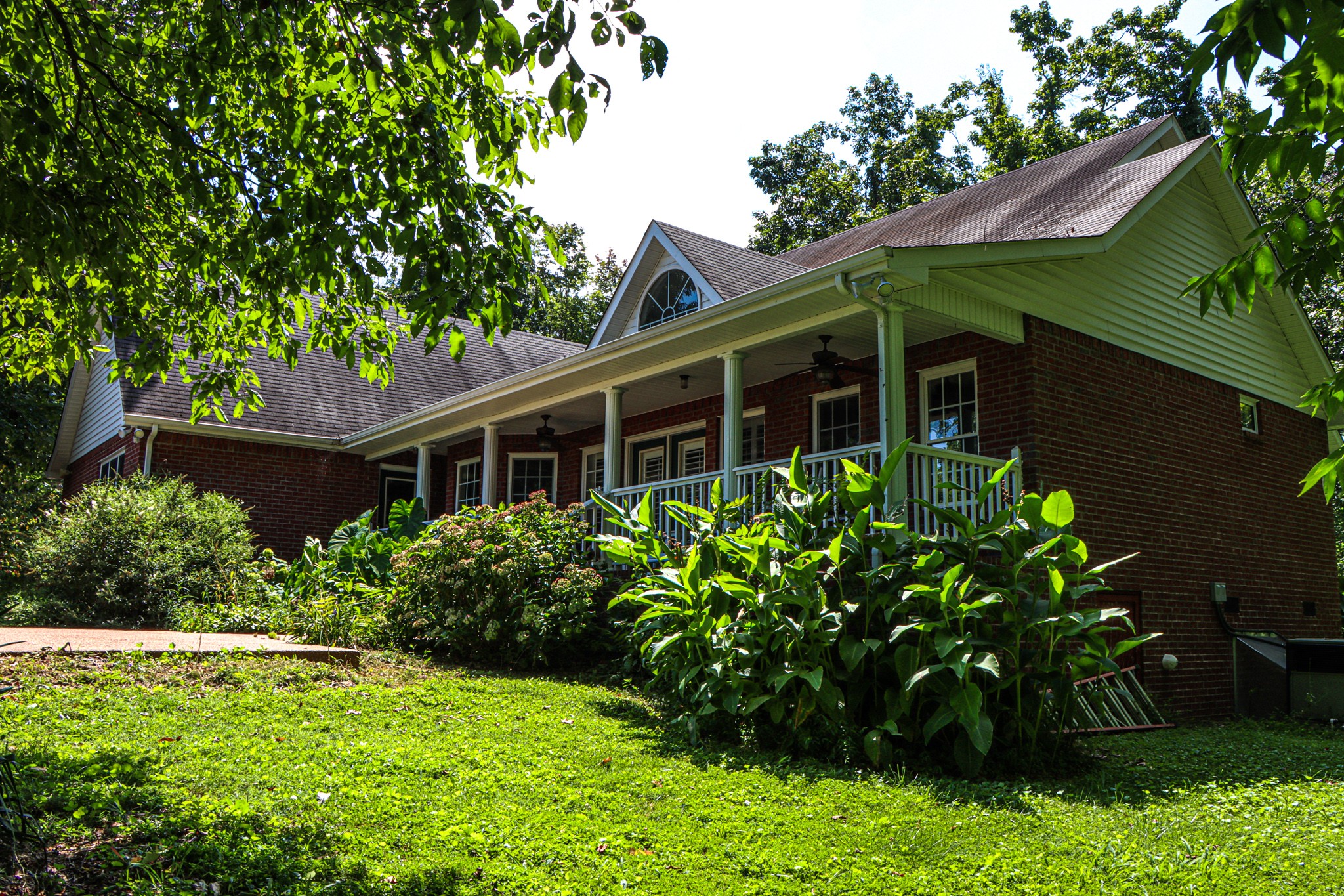 2963 Cole Ridge Road Beechgrove, TN 37018 - Photo 28 of 31 a view of a house with a flower garden