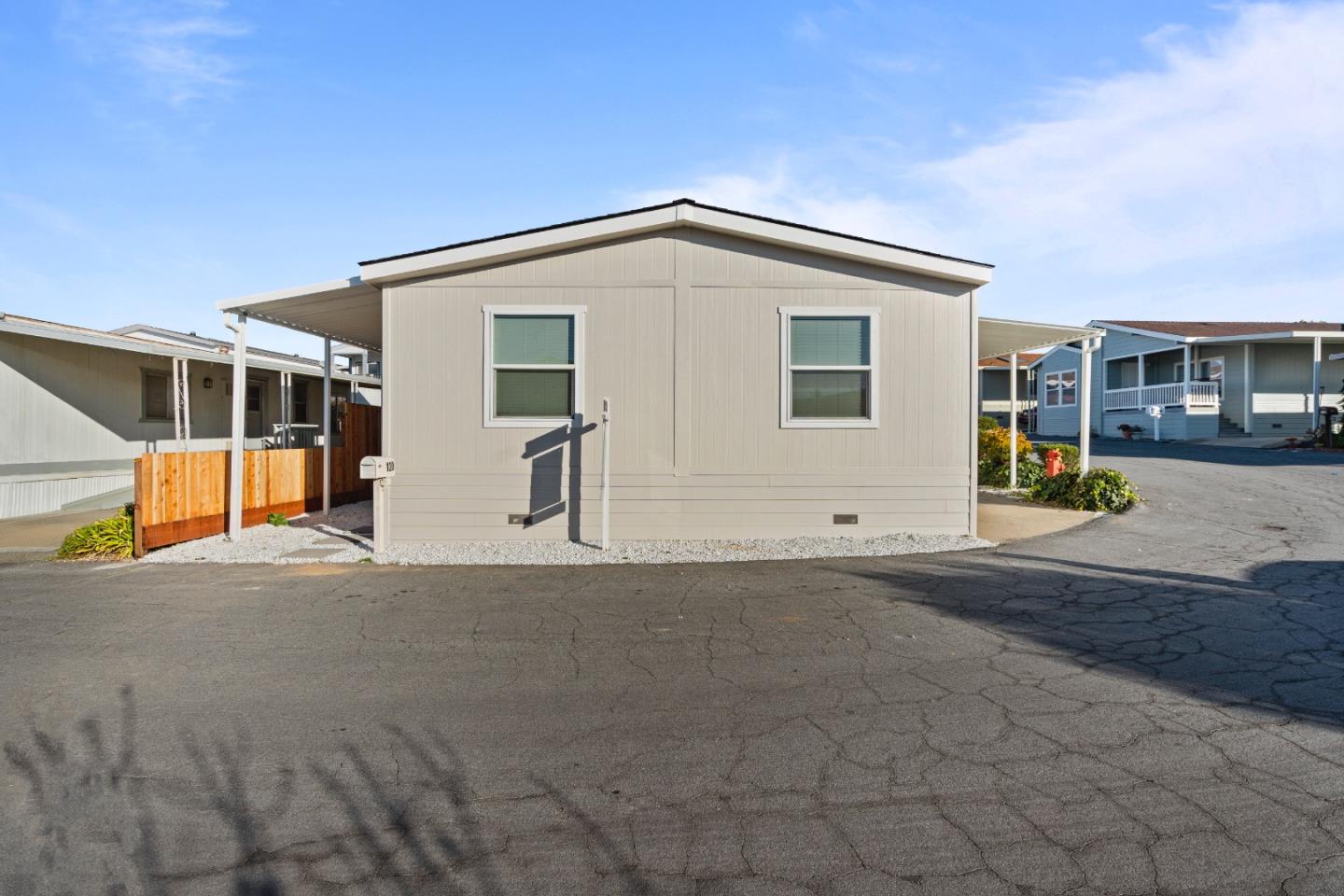 144 Holm Road, Unit 120 Watsonville, CA 95076 - Photo 2 of 25 a view of a house with backyard
