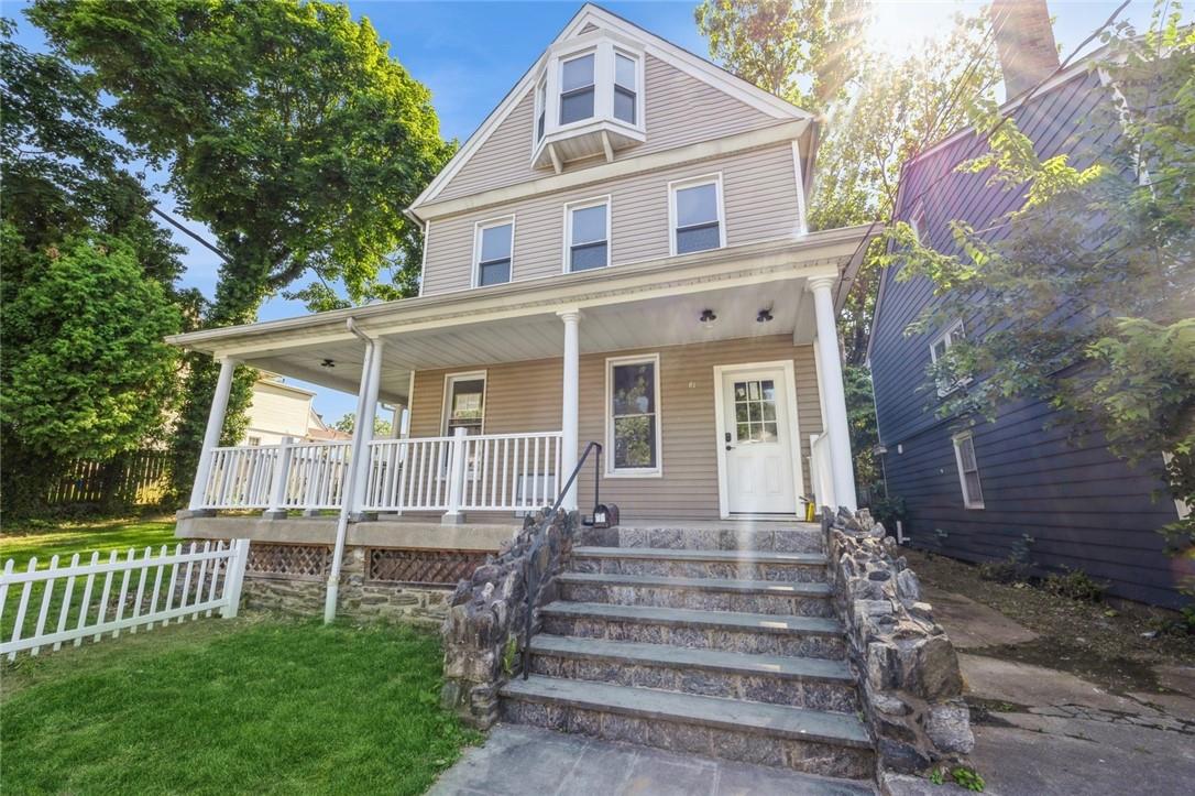 View of front of home with porch and front yard