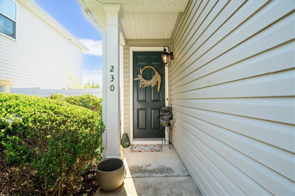 230 Silver Spring Street Dallas, GA 30157 - Photo 1 of 1 a side view of a house with potted plants