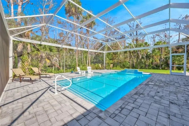 a view of a backyard with a patio