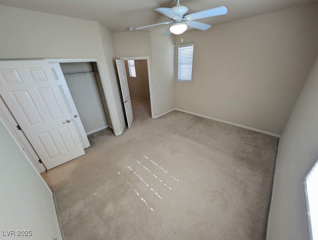 62 Augusta Course Avenue Las Vegas, NV 89148 - Photo 17 of 26 Unfurnished bedroom featuring carpet flooring, a closet, and ceiling fan