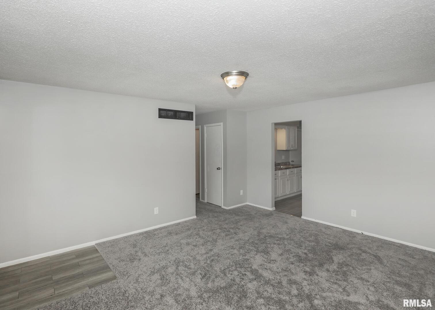 1310 Calvin Street Davenport, IA 52804 - Photo 15 of 39 a view of an empty room and window