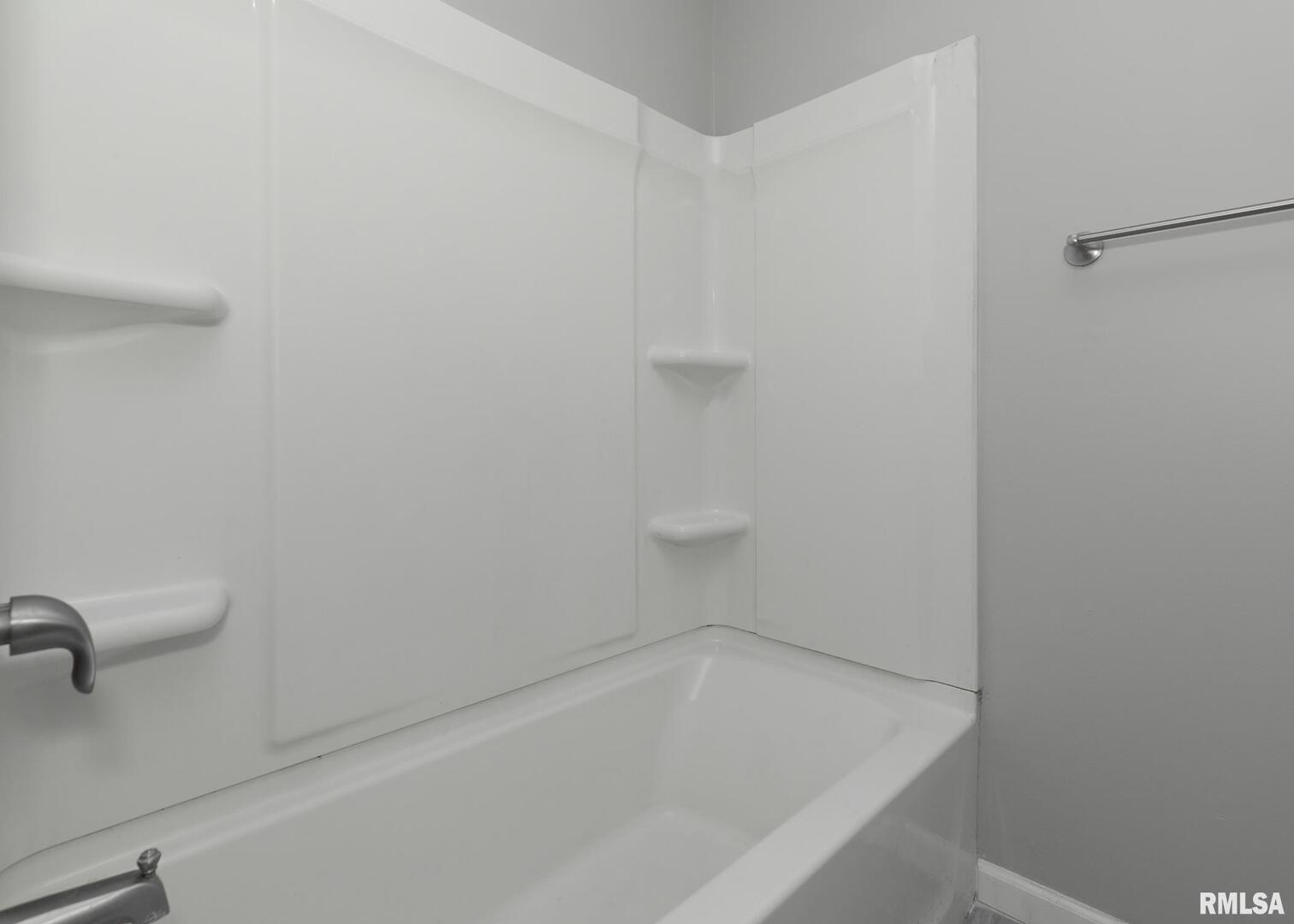 1310 Calvin Street Davenport, IA 52804 - Photo 16 of 39 a close up of a bathtub